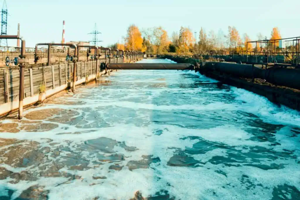 water facility with foam on top of the processing water
